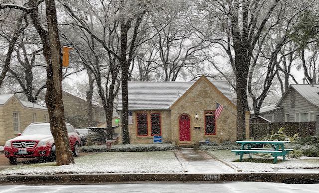 house covered in snow